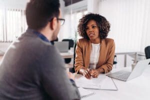 A concerned individual seeking advice from a legal professional regarding divorce mediation.